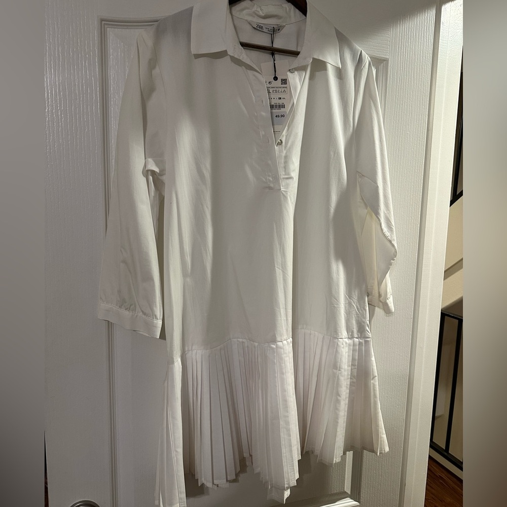 Shirt dress with pleaded skirt